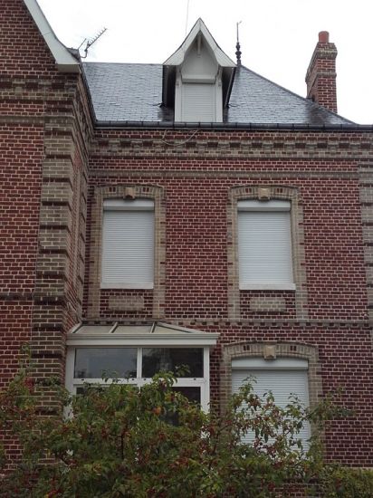 Rénovation de façades anciennes dans l'Eure.